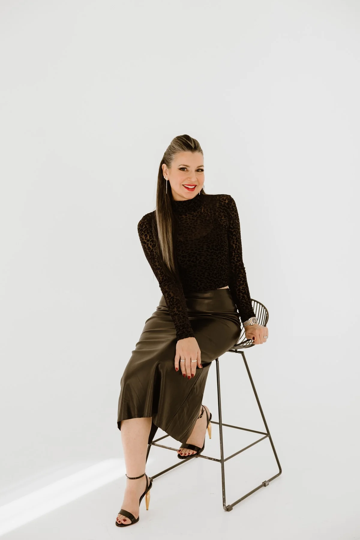 Velda Salazar seated for a studio portrait